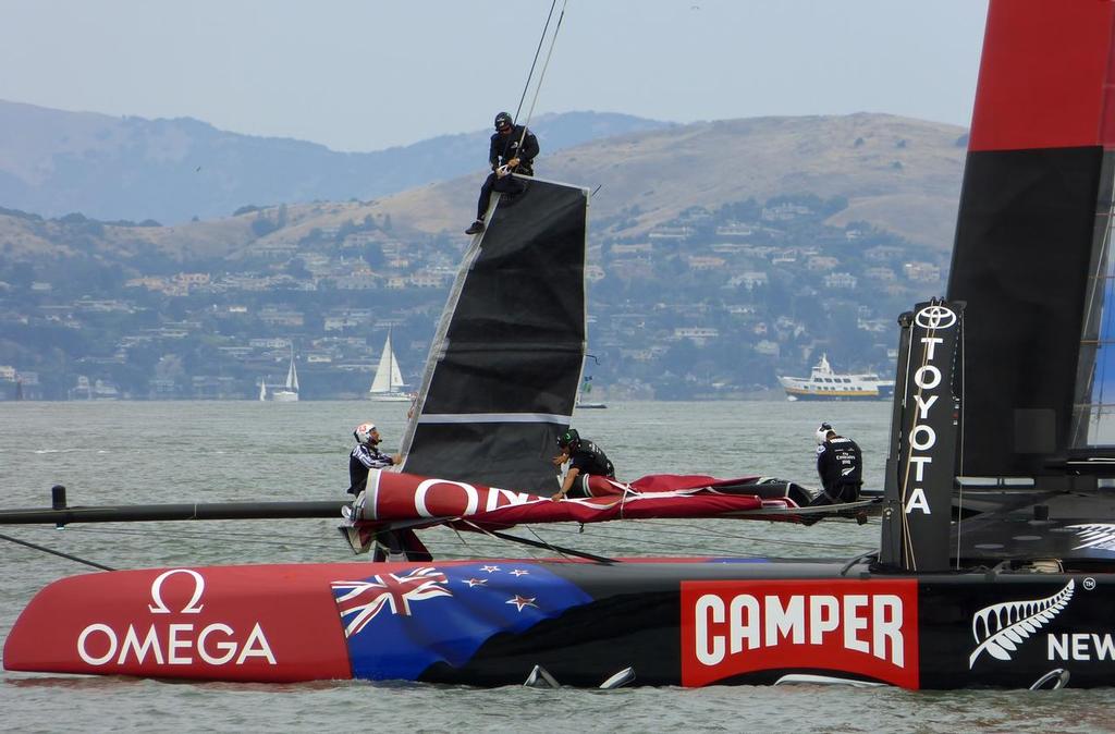 Emirates Team NZ checks the jib halyard clip before the start - Louis Vuitton Cup, Round Robin 4, Race 1, July 23, 2013 © John Navas 